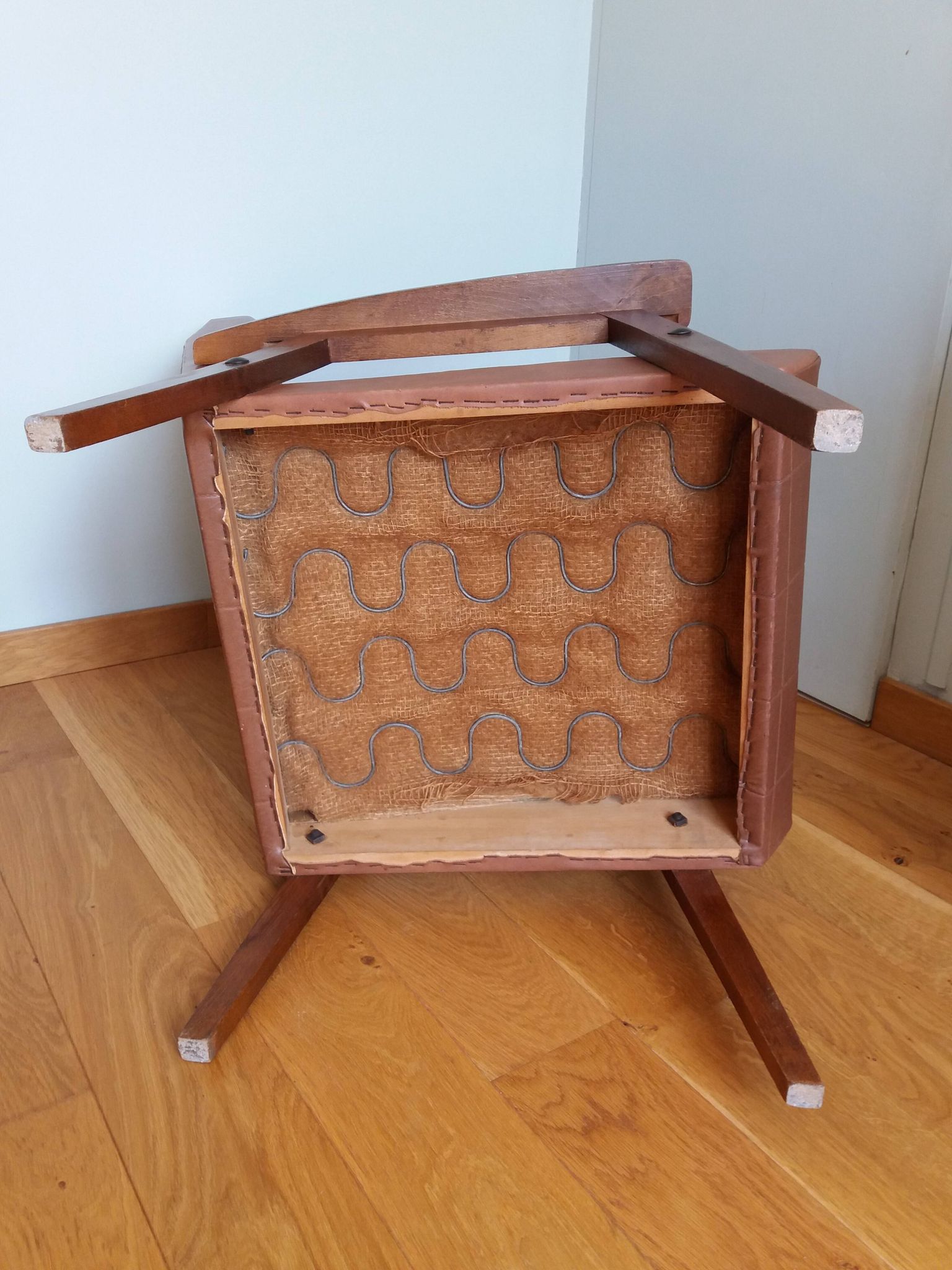 Scandinavian brown skai and wood armchair