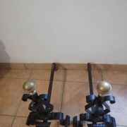 Pair of wrought iron andirons and brass ball.