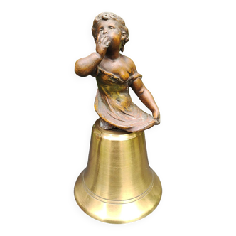 Brass bell enhanced Sculpture Girl blowing a kiss- by Lecorney. In bronze. XIXth