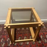 Brutalist table in wood and smoked glass