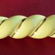 12 yellow and gold ceramic knife rests in their case from the 1950s.