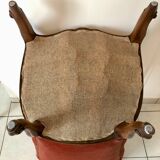 Petit fauteuil capitonné