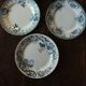 A set of 4 flat plates Terre de fer mismatched blue