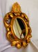 Miroir vintage en bois doré