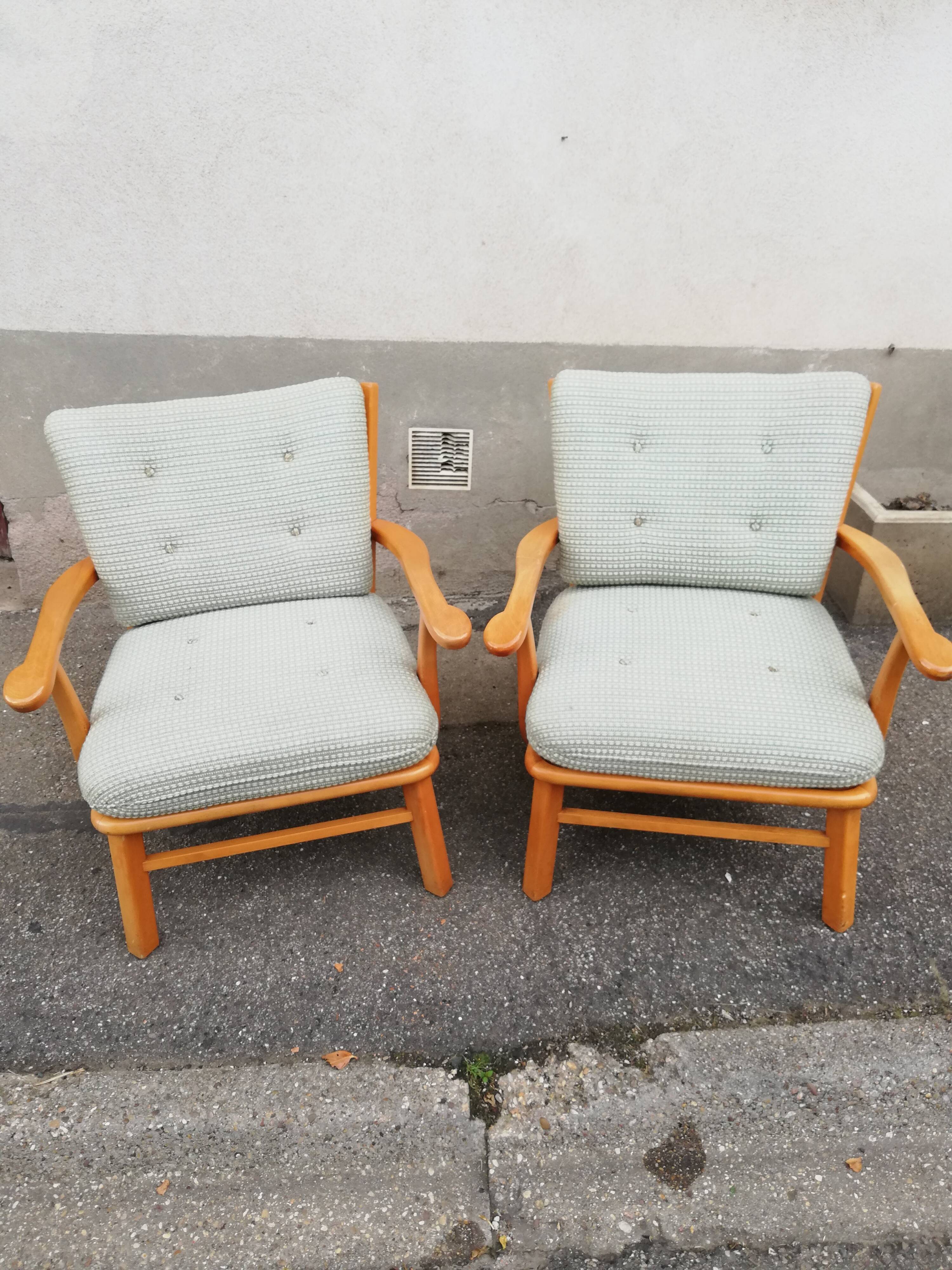 Pair of vintage pastel green fabric armchairs