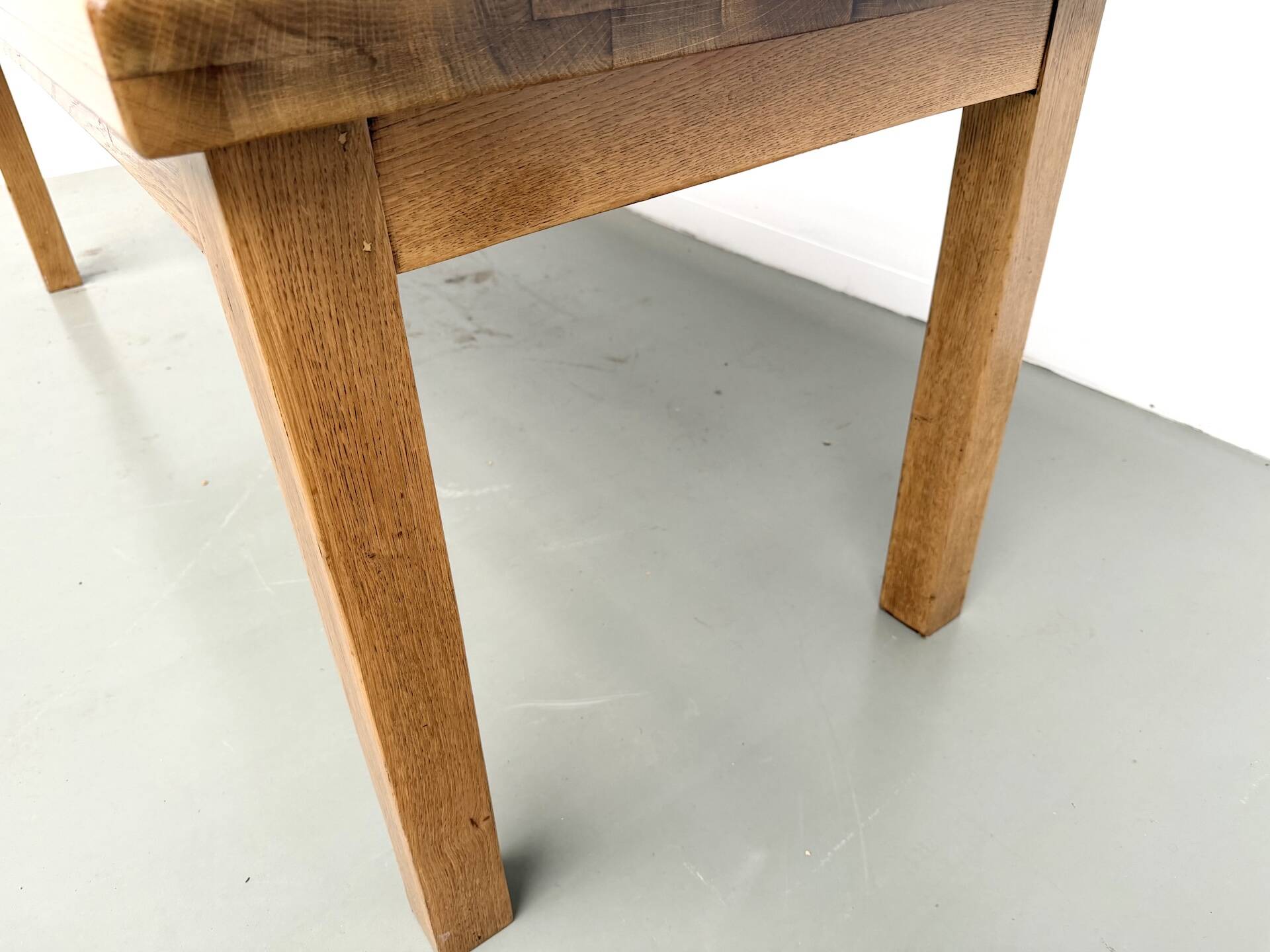 Solid oak farmhouse table, square legs.