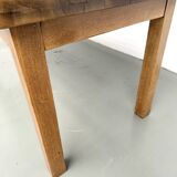 Solid oak farmhouse table, square legs.