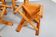 Set of 4 dining chairs in elm wood and cognac leather.