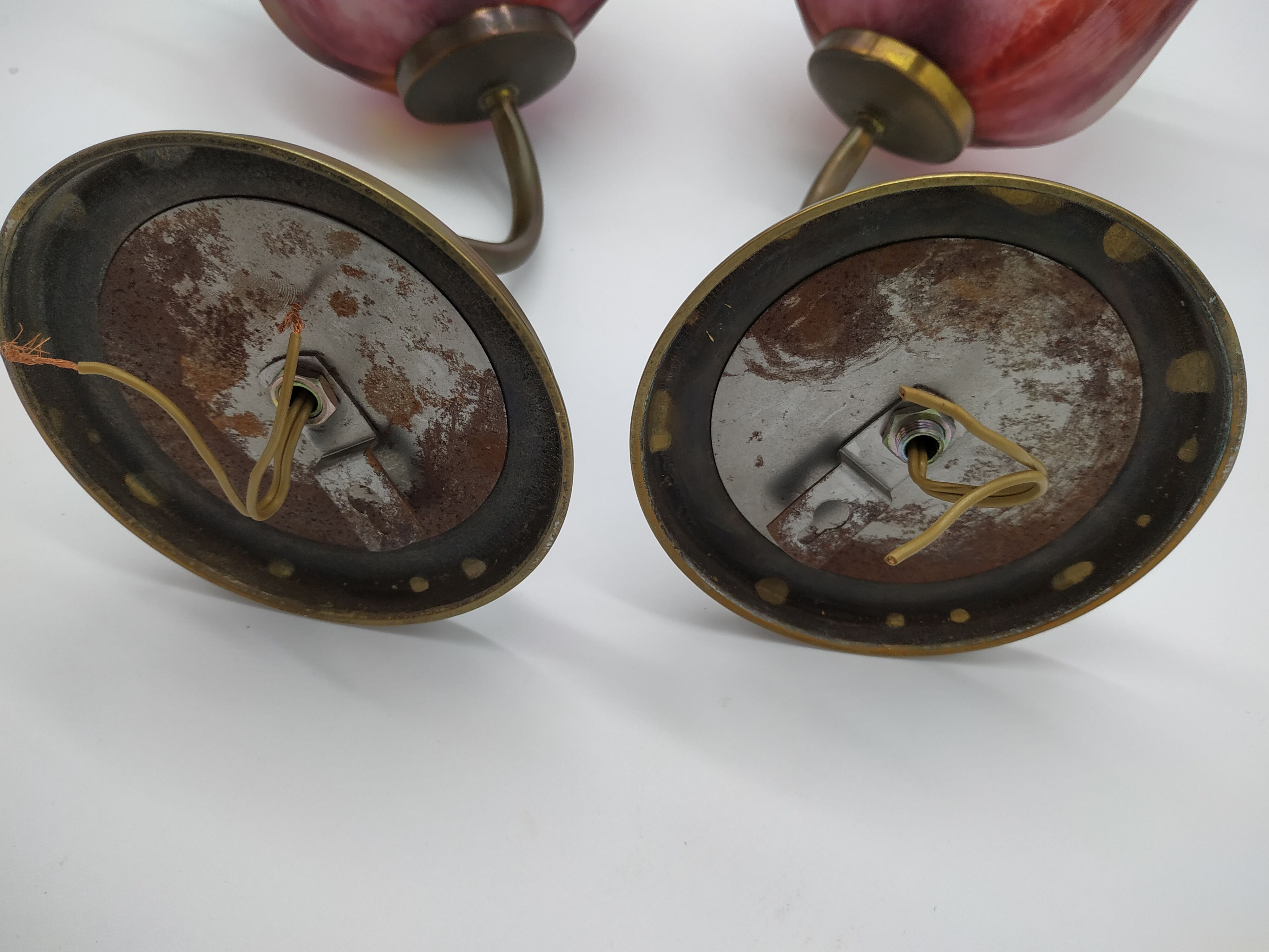 Pair of wall sconces in the shape of bells
