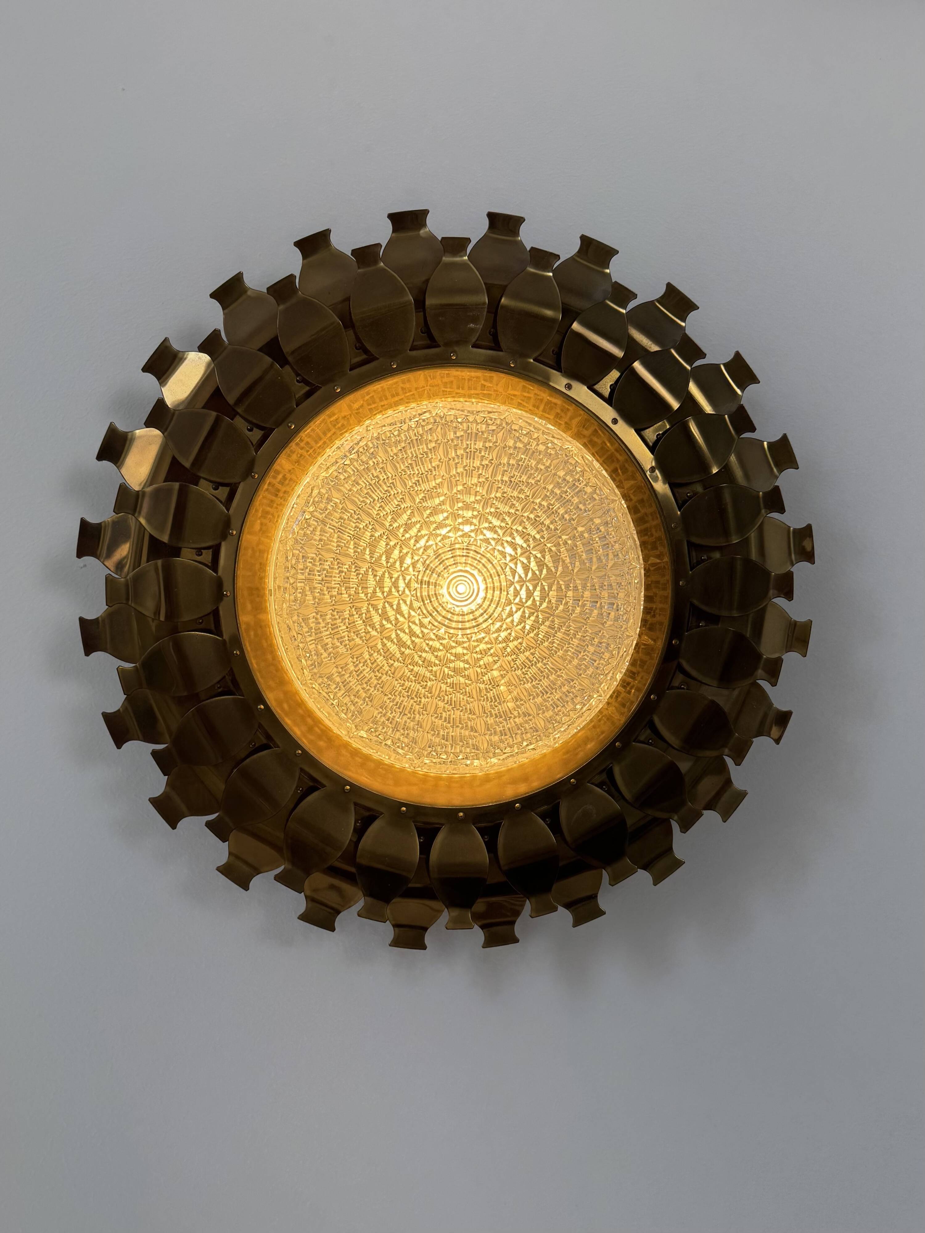 Vintage brass and pressed glass wall light, Sweden, 1960.