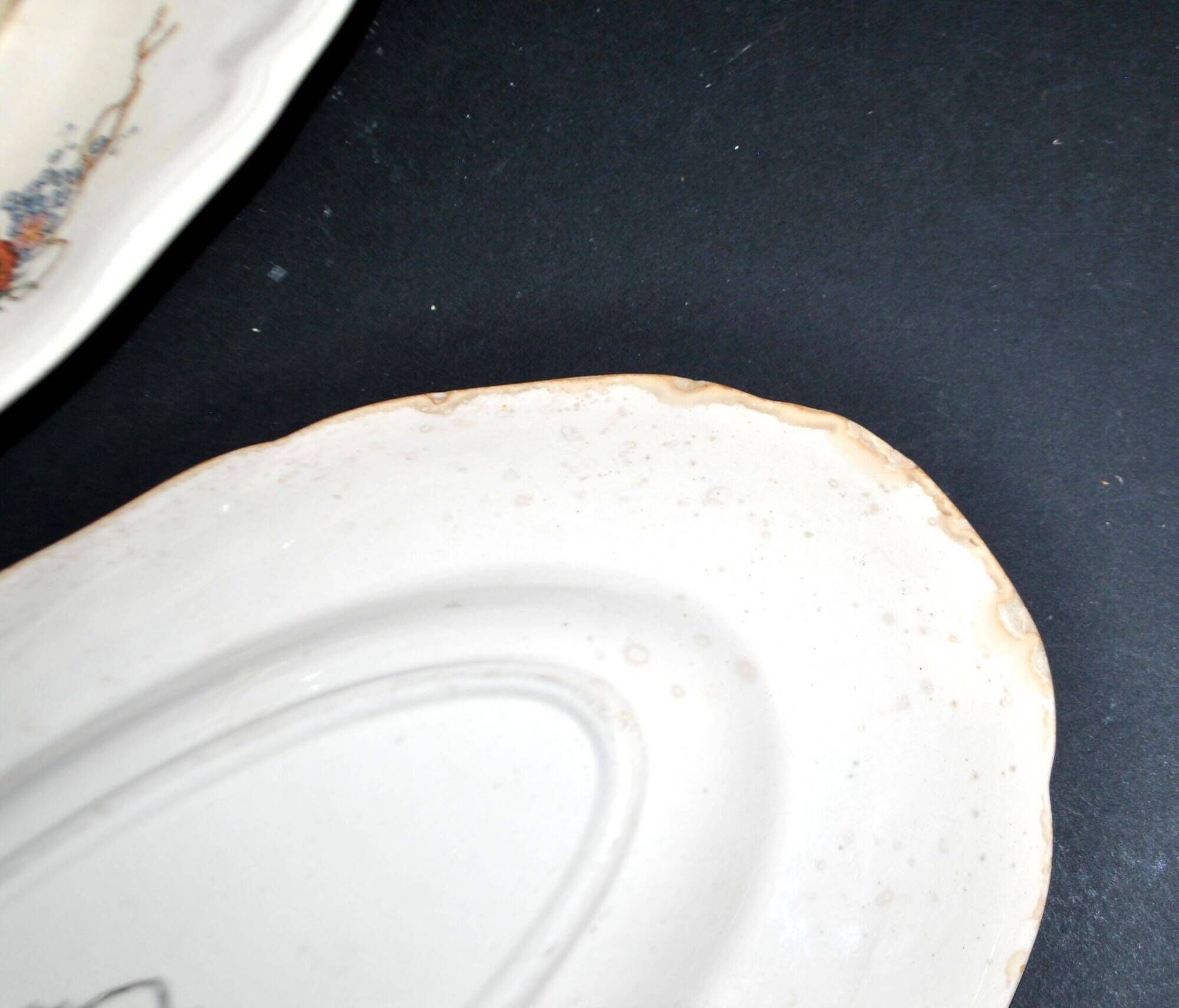 Sarreguemines sauce boat and dish in earthenware with "Obernai" decoration by Henri Loux