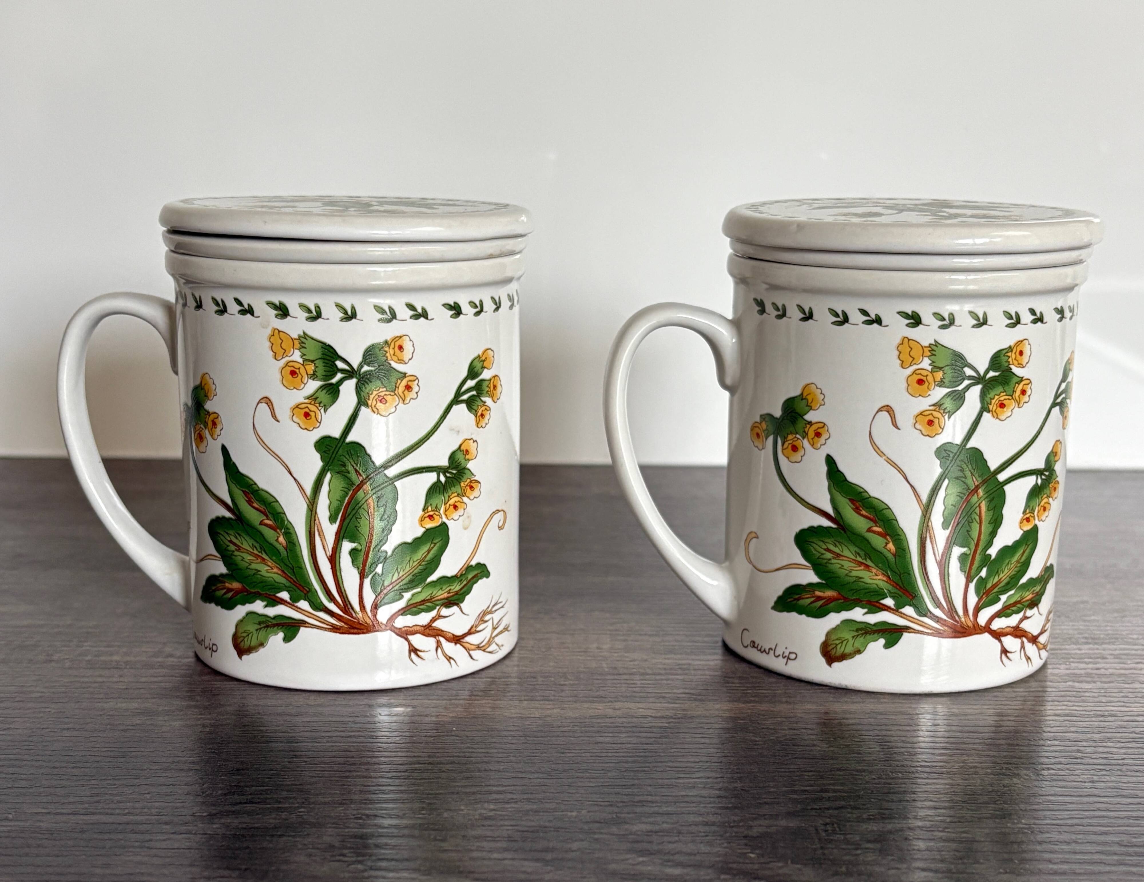 Pair of vintage infusion mugs.