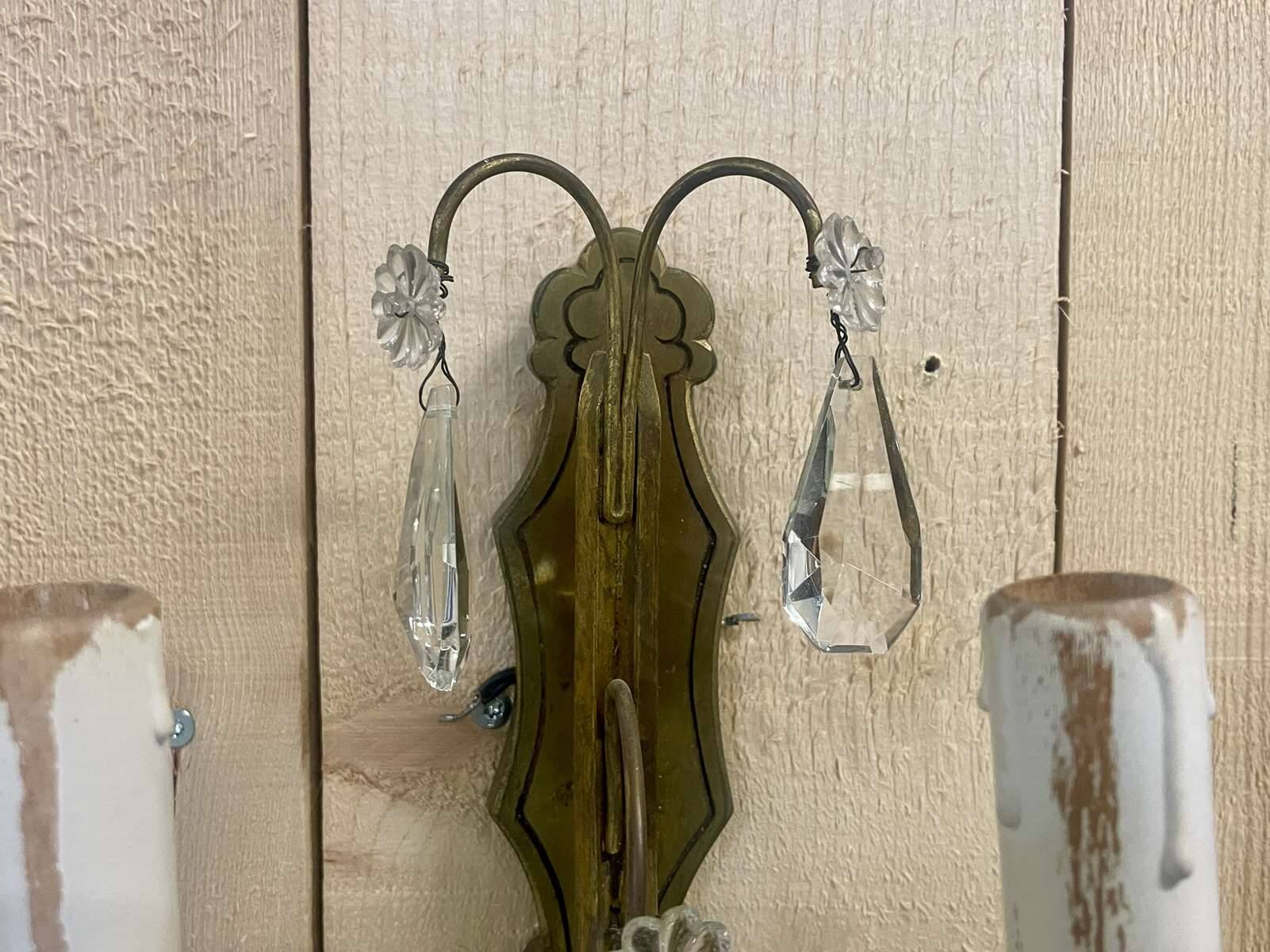 Pair of bronze sconces and pendants from the early 20th century