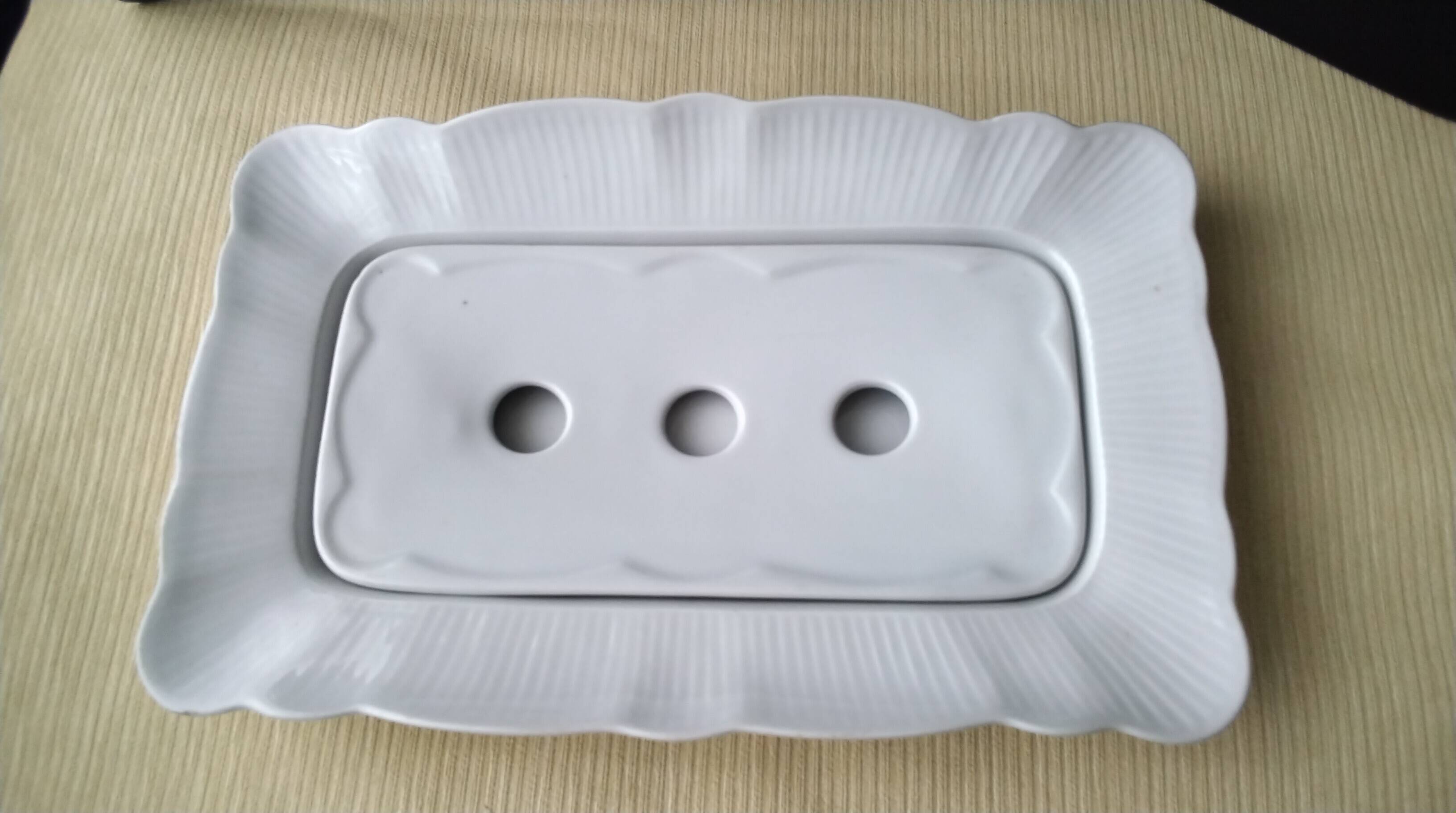 White porcelain asparagus dish by Pillivuyt