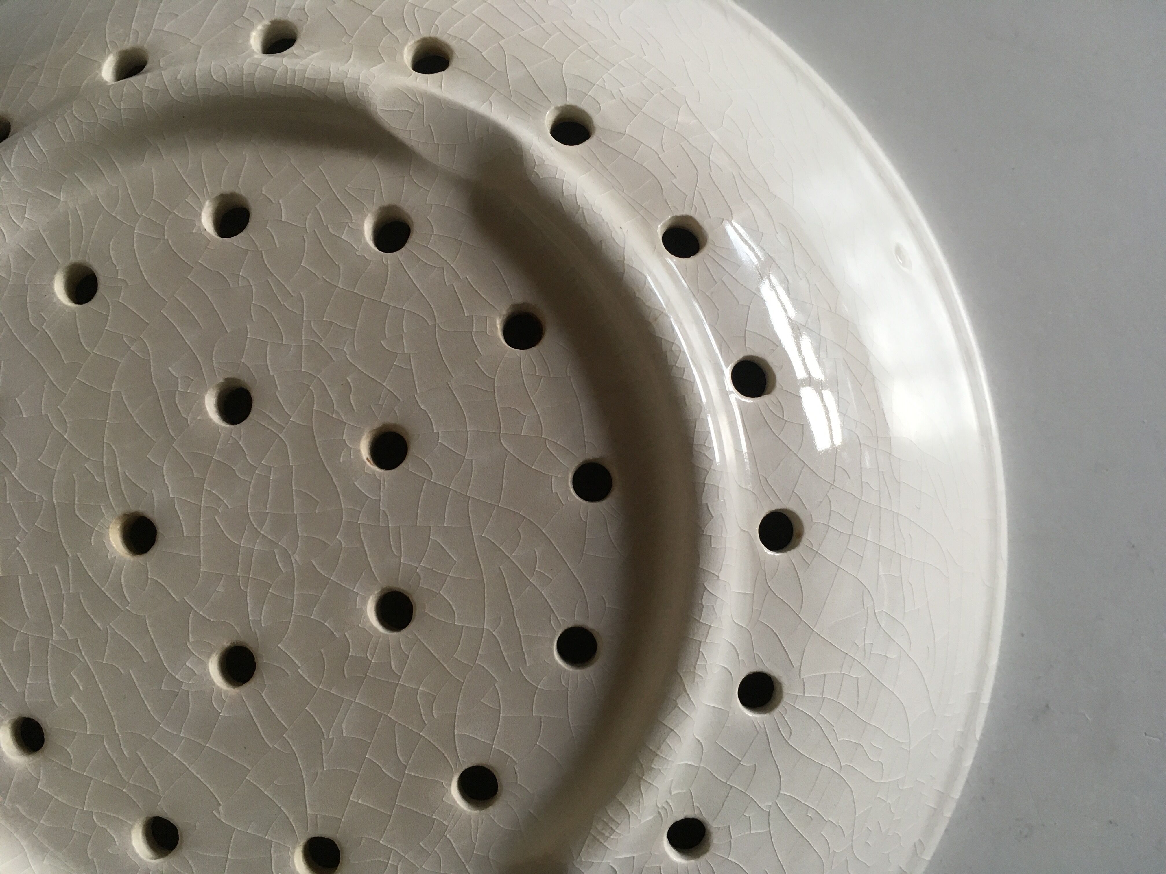 Perforated pheasant plate in 1900s iron earth