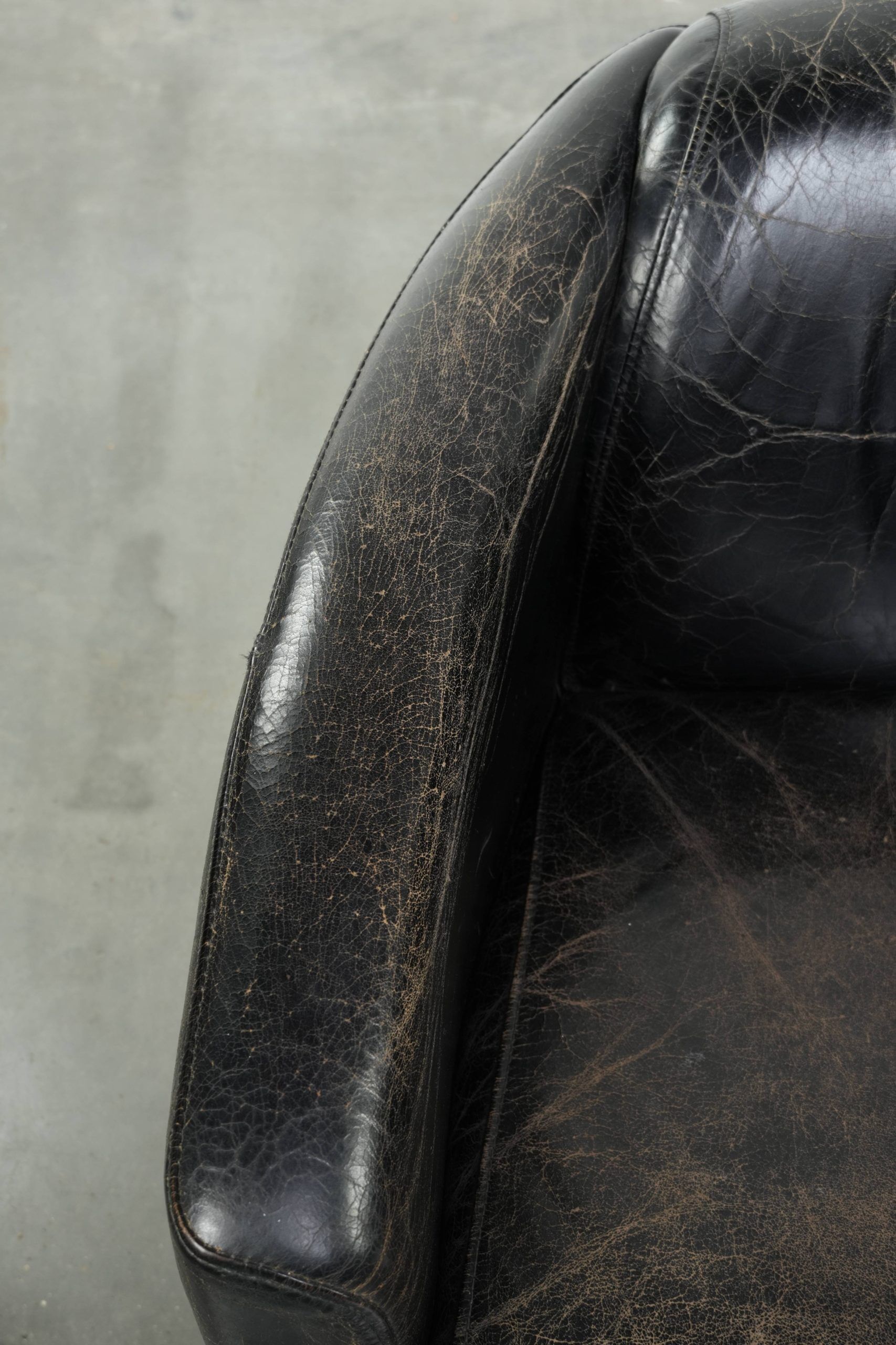 Set of two black vintage cowhide aviator design armchairs