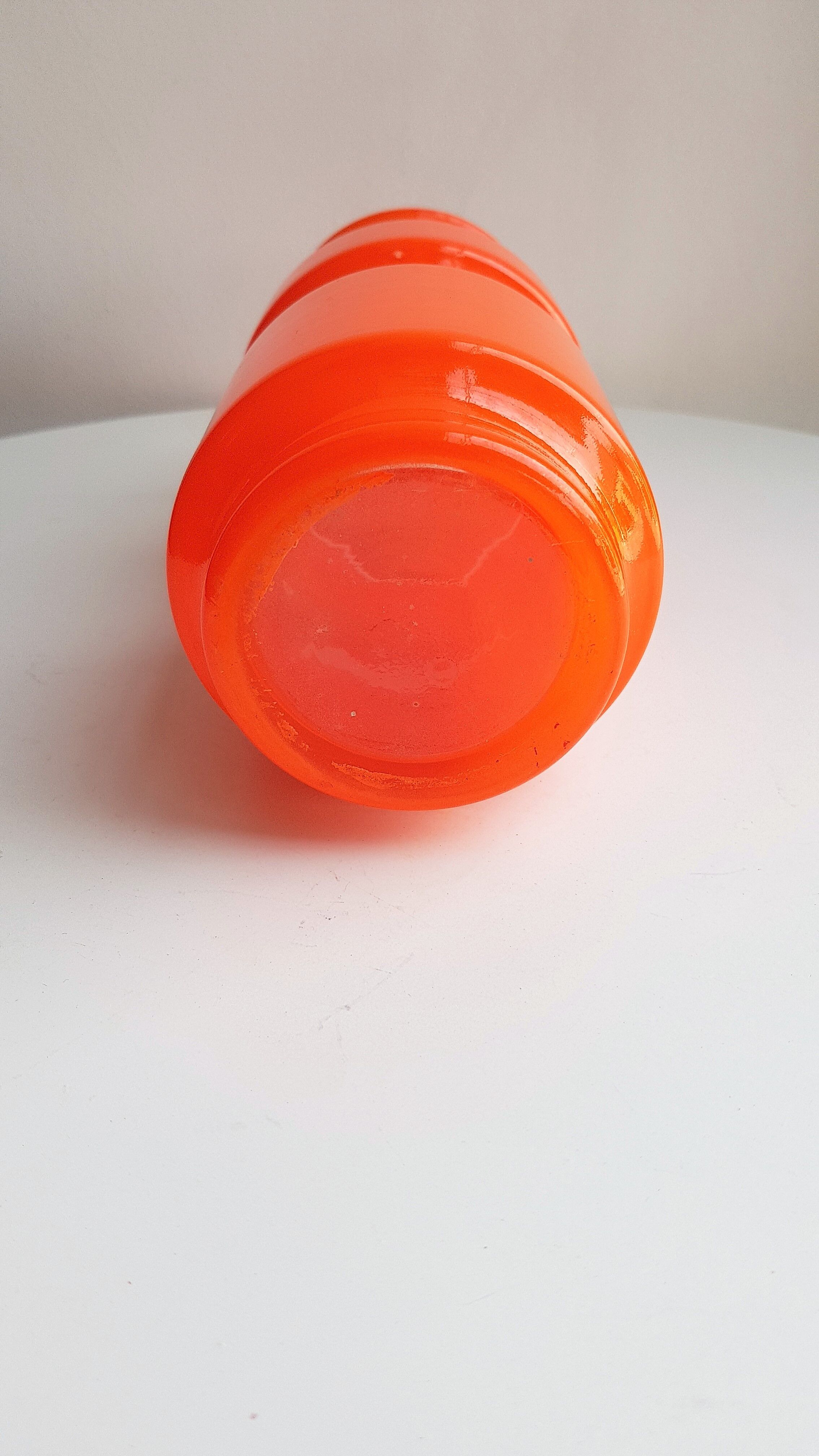 Vintage vase in orange glass