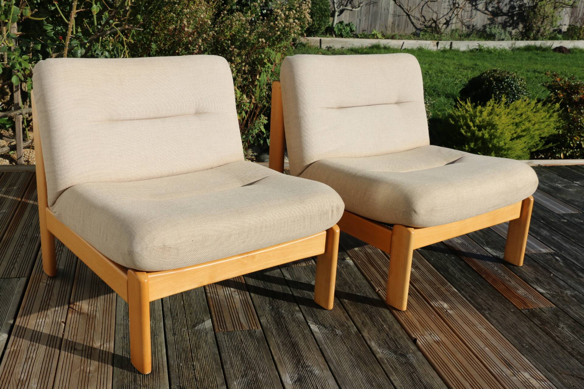 Pair of wood and fabric lounge chairs, 1980