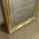 19th-century mirror in gilded wood and plaster.
