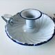 Antique candle holder in white and blue enamelled metal