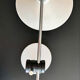 Articulated lamp in white colour.