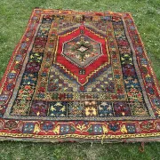 Old Moroccan carpet, made of natural wool and handwoven.