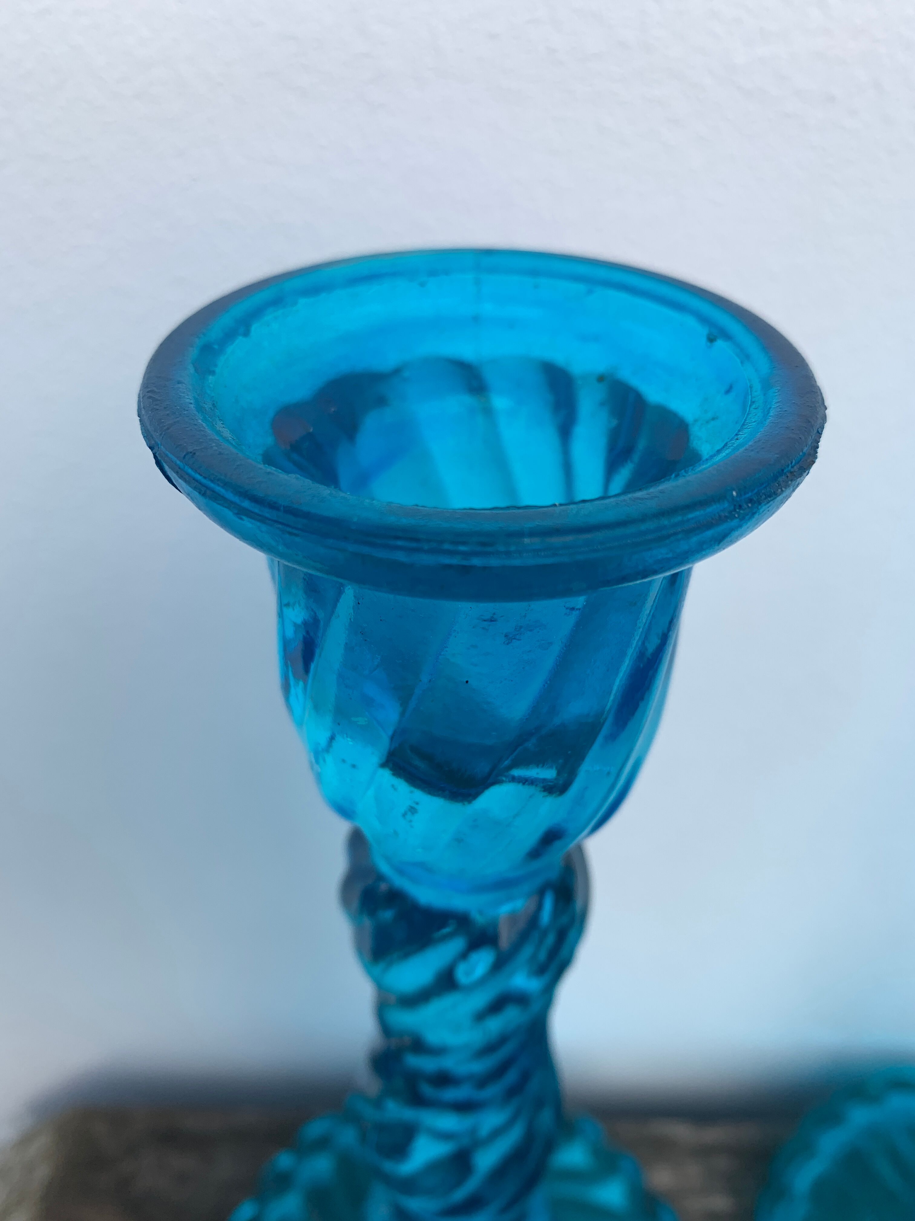 Pair of molded pressed blue glass candle holders