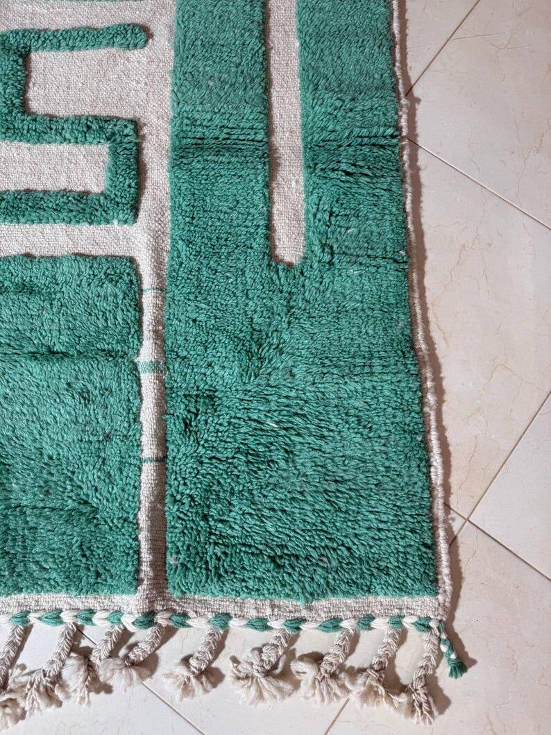 Beni Ourain Berber rug made of natural wool, traditionally handwoven.
