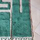 Beni Ourain Berber rug made of natural wool, traditionally handwoven.