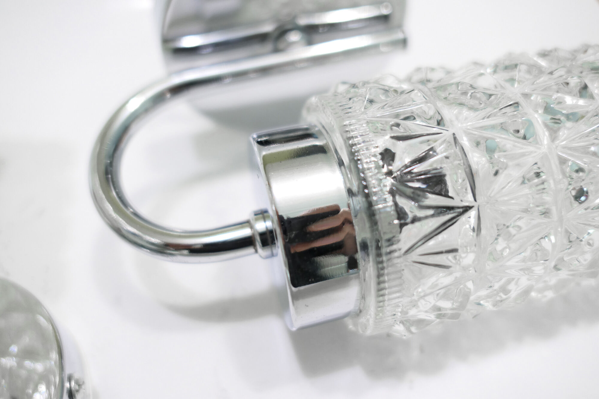 Pair of 1970 chrome metal wall light and molded glass globes.