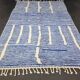 Handwoven Berber rug in blue and white, size 150x250 cm.