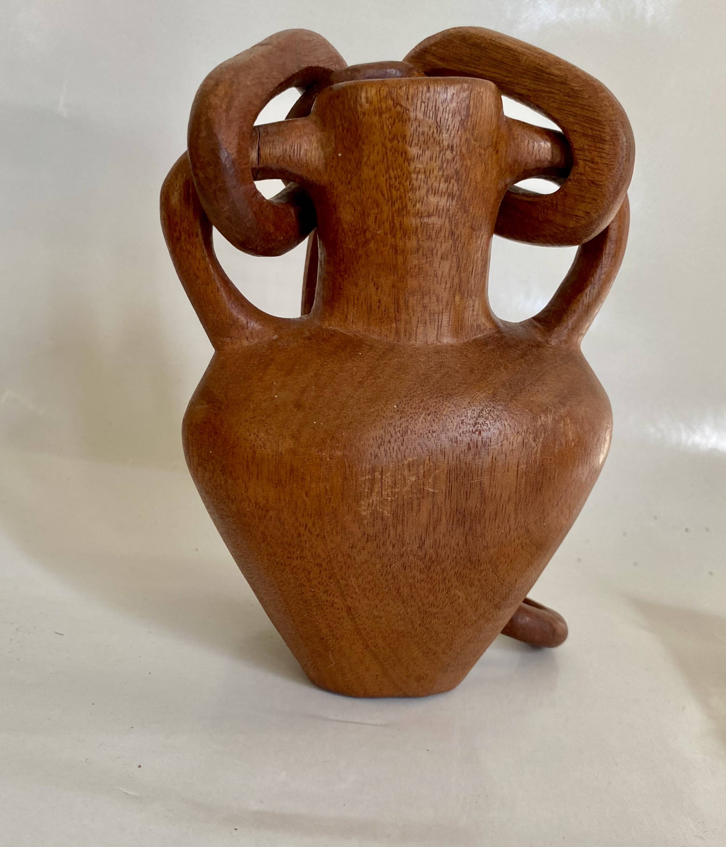 Vase and wooden chain to hang