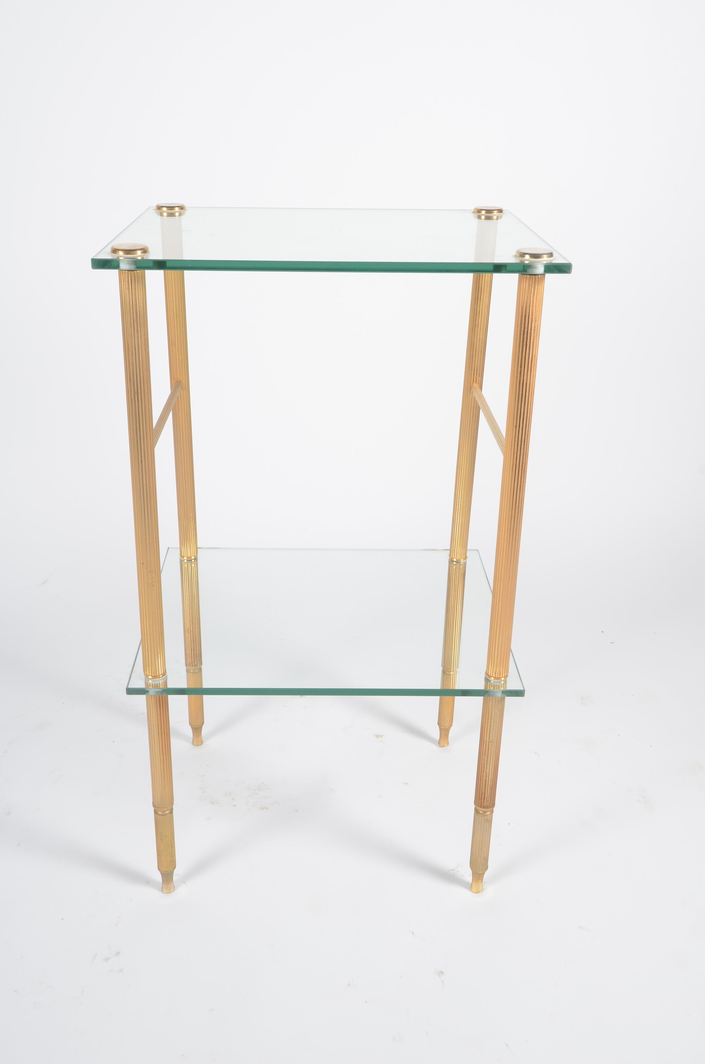 Glass and golden brass side table