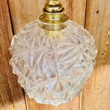 Globe pendant light in chiseled glass