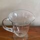Engraved glass pitcher