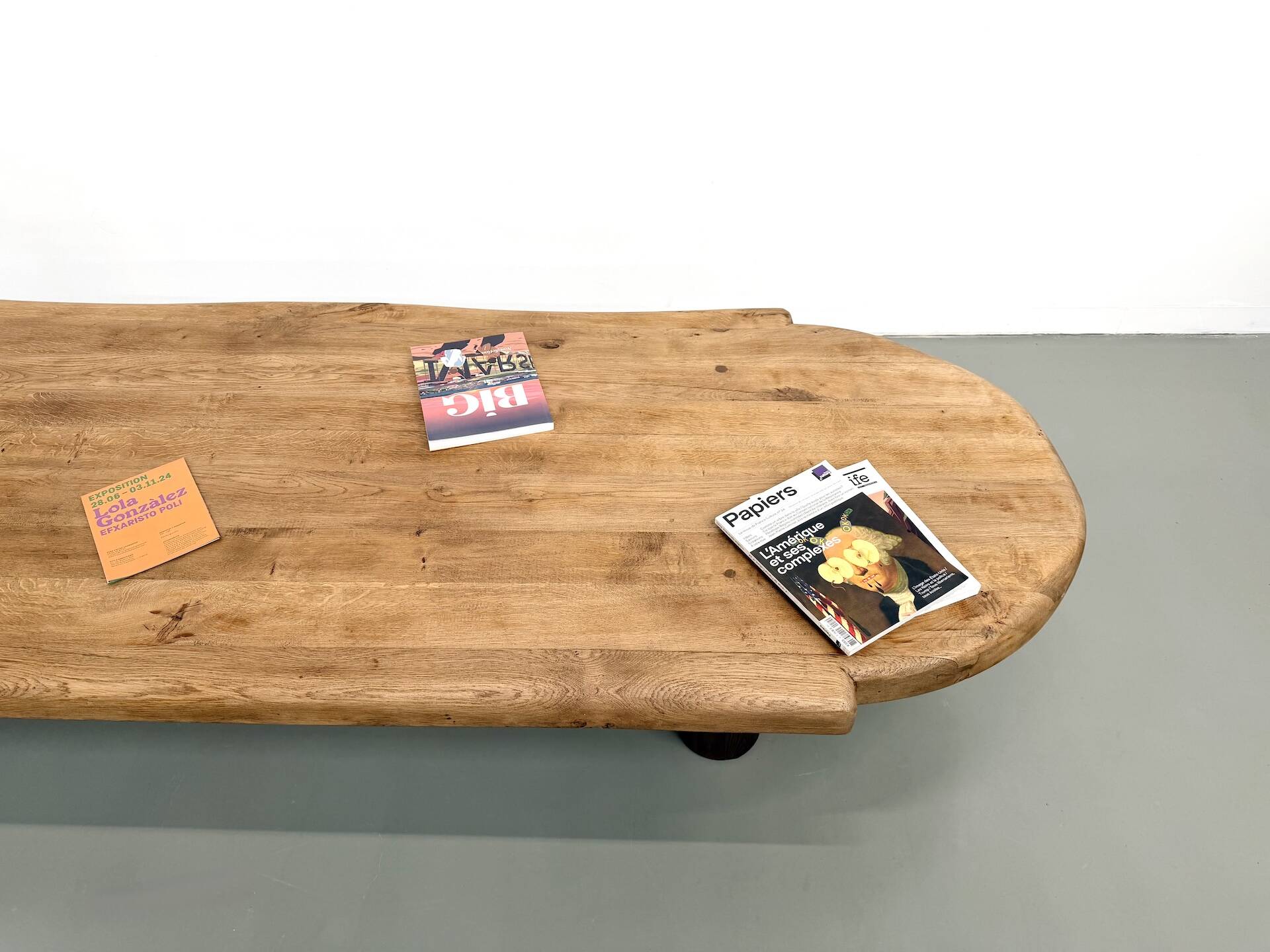 XXL oval coffee table in solid oak, cylindrical base, 1950s.