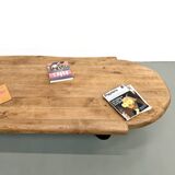 XXL oval coffee table in solid oak, cylindrical base, 1950s.