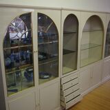 Showcases in lacquered wood, glass and brass  1970s, set of 4