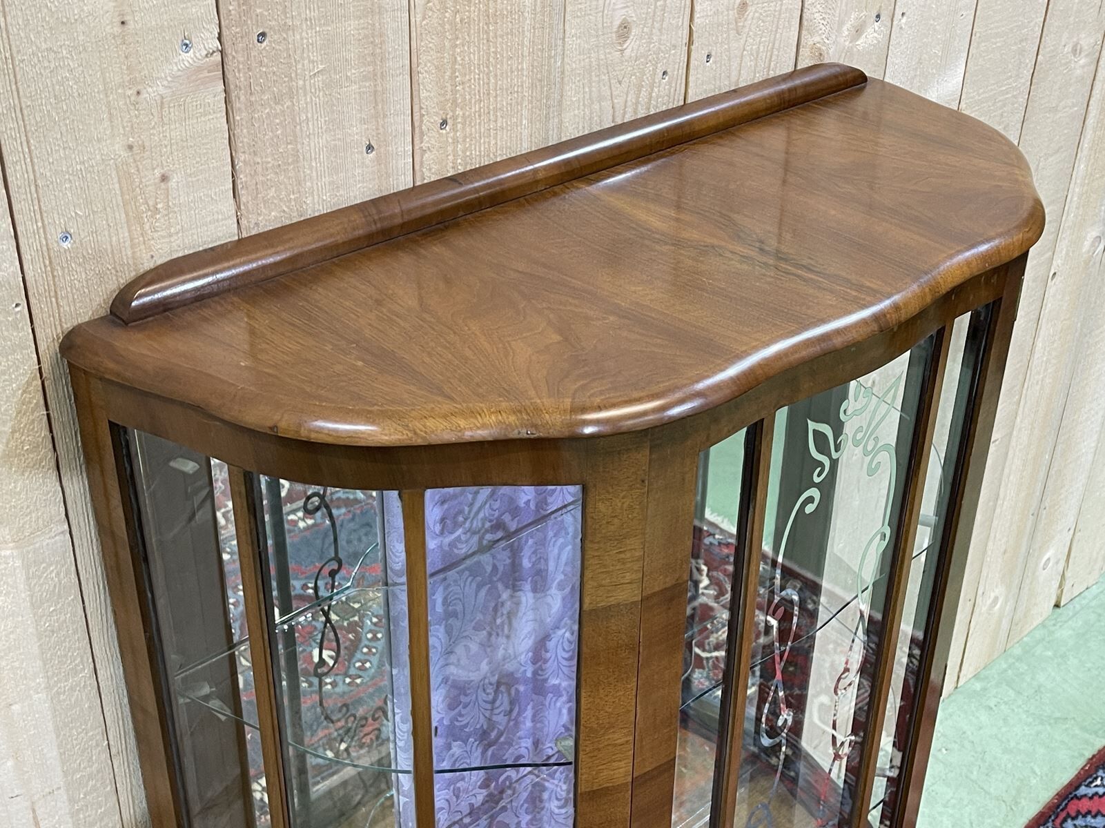 English walnut showcase from the 1930s