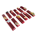 Set of vintage red ceramic knife holders, marine motif, retro style