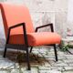 Fauteuil orange et noir scandinave restauré