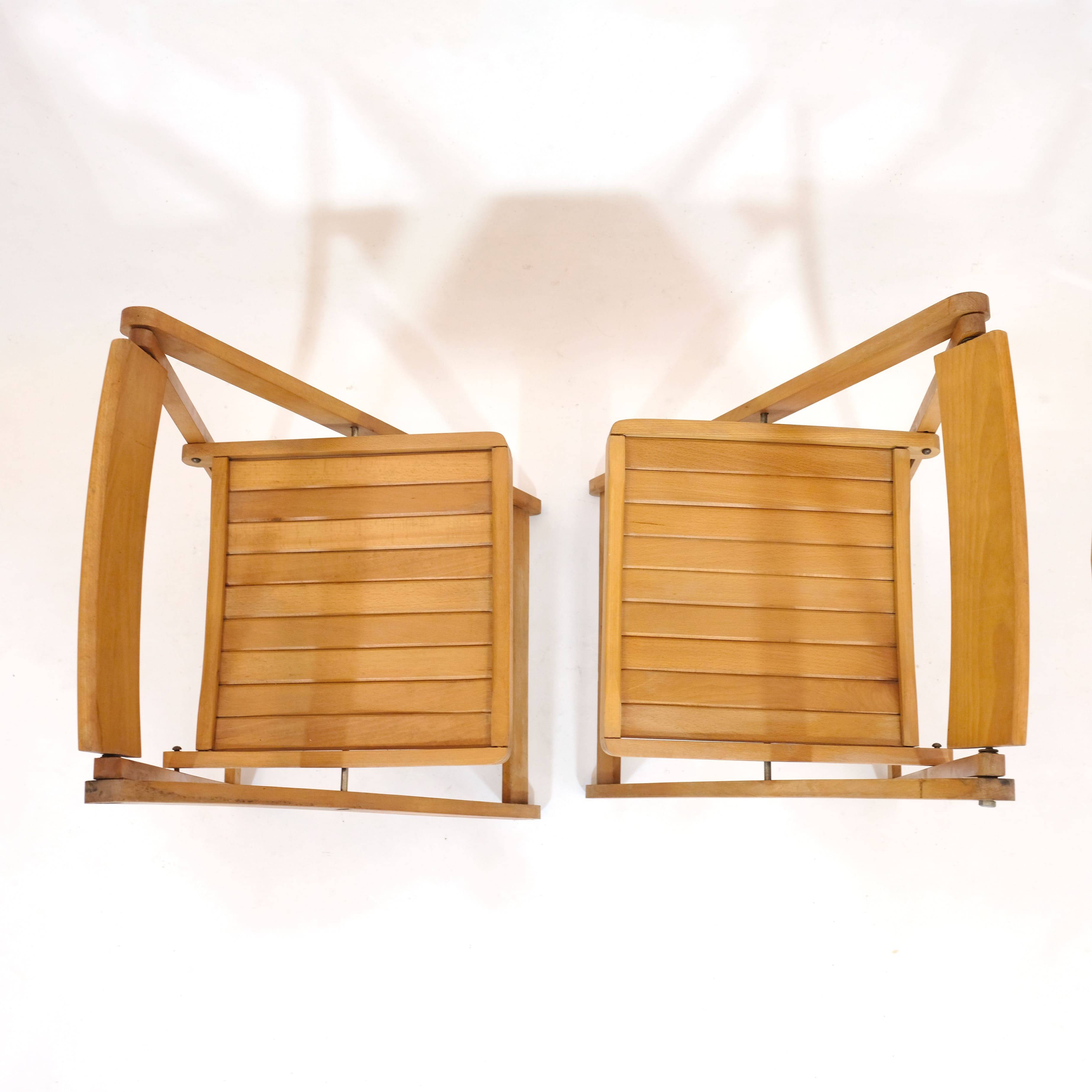 Pair of wooden folding chairs from the 80s.