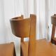 Lot de 4 chaises de salle à manger vintage / design sculptural en bois des années 70, cuir marron