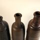 Lot of three old sandstone bottles