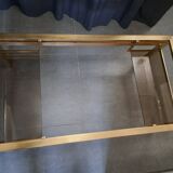 Table basse Guy Lefevre en laiton et verre