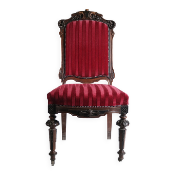 Nineteenth-century French carved chair with red velvet