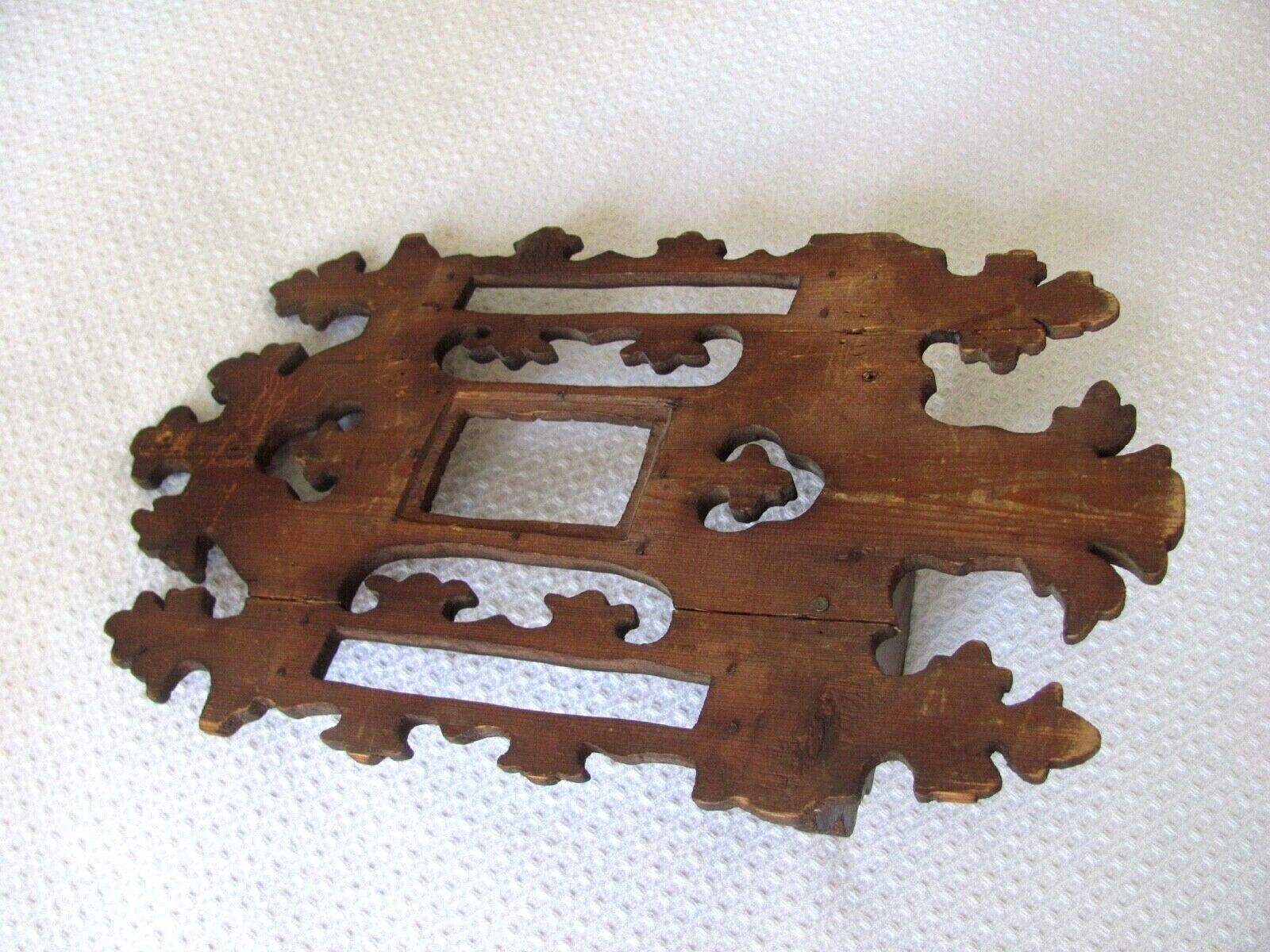 Shelf to hang in carved wood, early 20th century