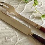 Service cutlery, brass and rosewood.