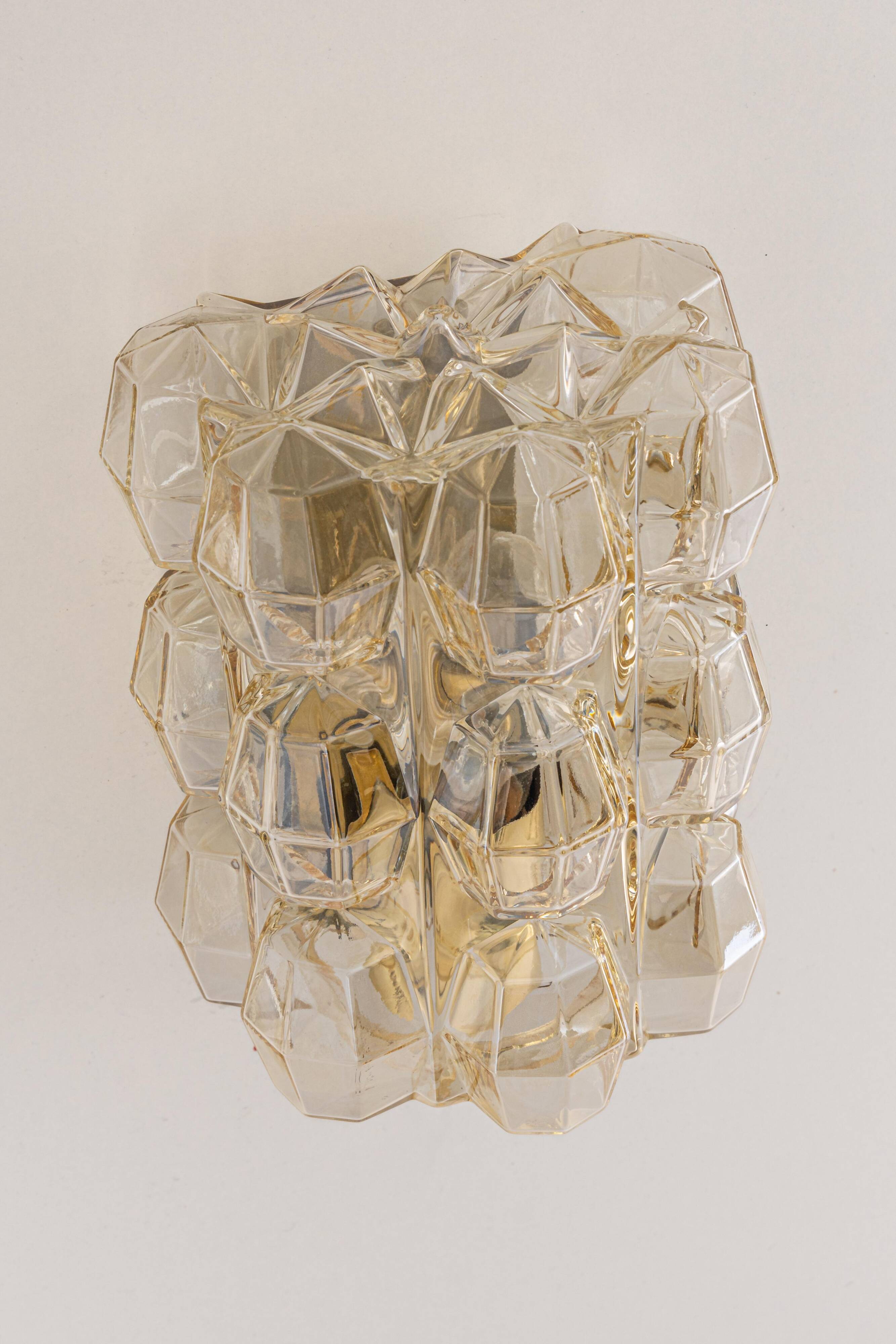 Large amber wall lamp in bubble glass by Helena Tynell, Limburg, Germany.