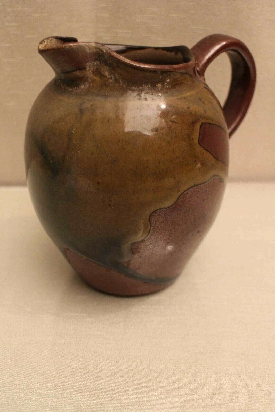 Pitcher in glazed sandstone